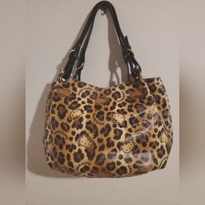 Hello kitty, cheeta print, purse.